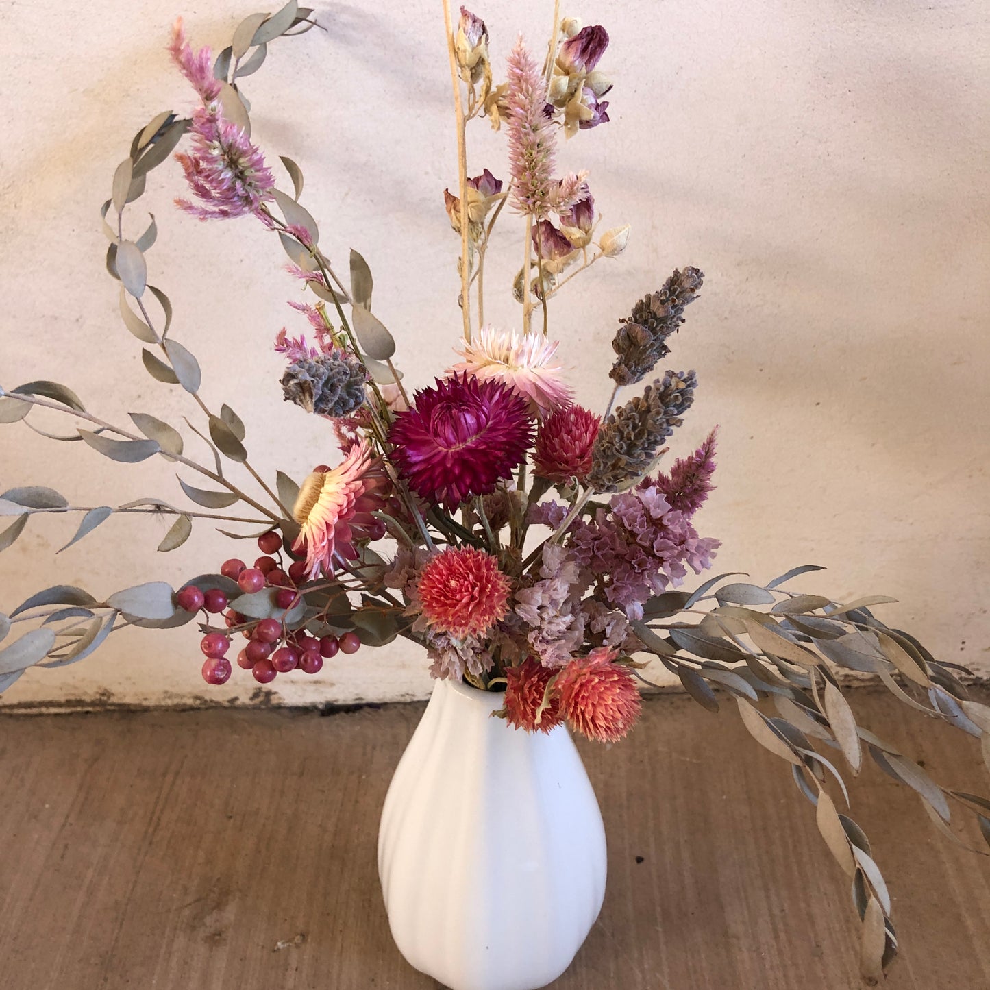 Dried flower arrangement with vase